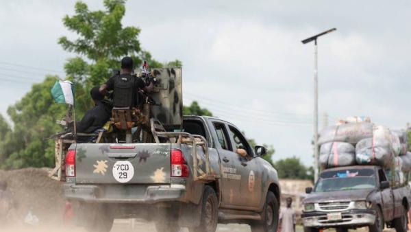 A Nigerian Army vehicle moves in the town of Dikwa during the dsitrubution of food aid to beneficiaries at a World Food Programme distribution centre in Dikwa, Borno State, Nigeria, August 27, 2025. REUTERS/Sodiq Adelakun.